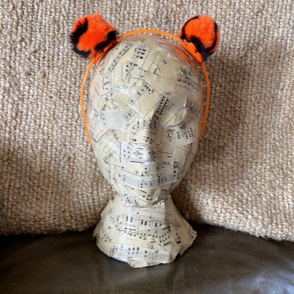 Handcrafted pom pom headband. Tiger on orange.  New!